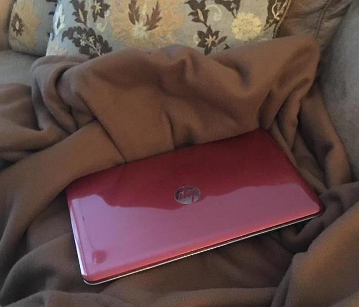 Laptop on a blanket